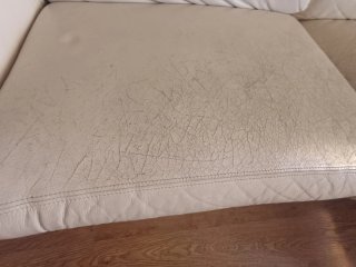 Sofá chaiselongue tela y piel