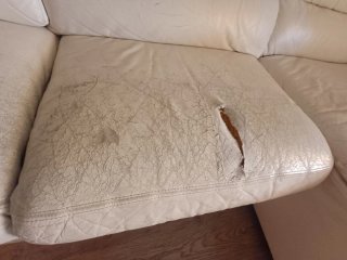 Sofá chaiselongue tela y piel