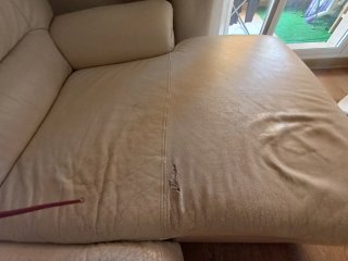 Sofá chaiselongue tela y piel