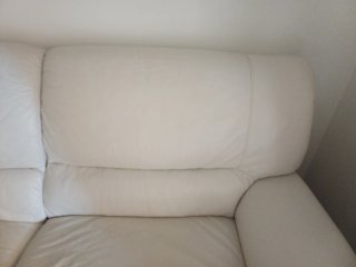 Sofá chaiselongue tela y piel