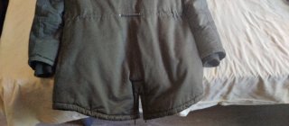 Parka verde forrada con pelo  naranja