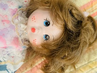 Muñeca de porcelana vintage