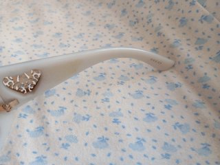 Gafas de sol beige y rosas