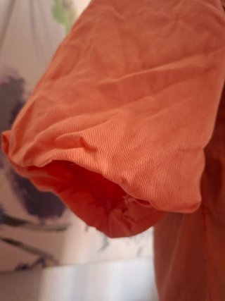 Blusa abullonada naranja