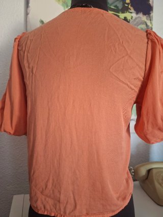 Blusa abullonada naranja
