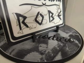 Placa Decorativa En esta casa se escucha Robe
