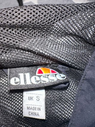 Abrigo Ellesse Negro y gris reflectante