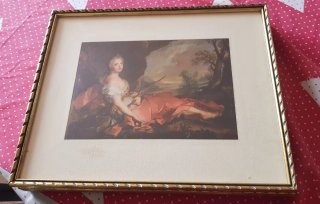 Quadro con cornice dorata, vetro e stampa.