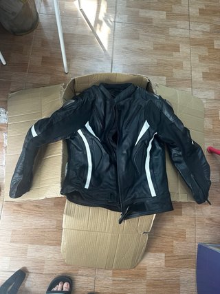 Mono de moto deportivo negro y blanco. Talla m