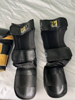 Guantes y espinilleras Buddha