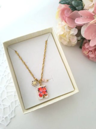 Collana  in acciaio con ciondolo floreale smaltato