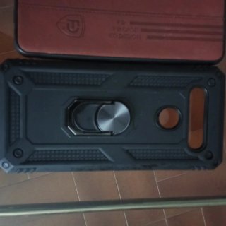Funda móvil con anillo rojo Tres fundas de móviles