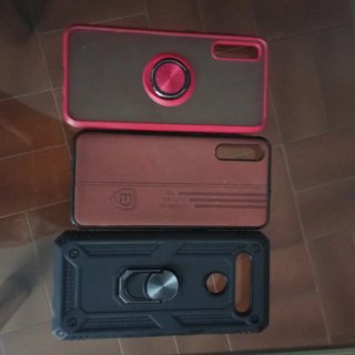 Funda móvil con anillo rojo Tres fundas de móviles