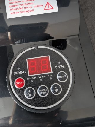 Secador de zapatos eléctrico negro