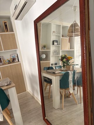 Espejo grande de madera y cristal