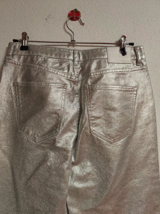 Pantalón plateado de chica talla 38 de Sfera nuevo