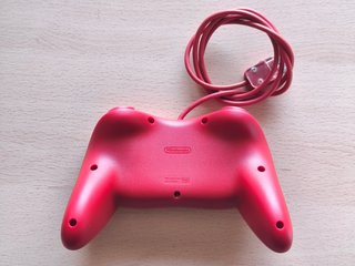 Mando Wii Clásico Pro Rojo con caja y manual