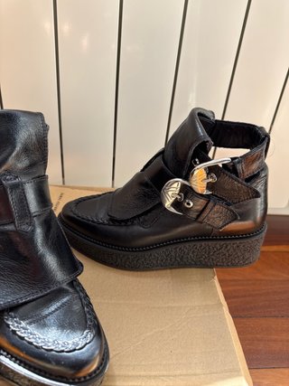 Botines piel negros hebilla