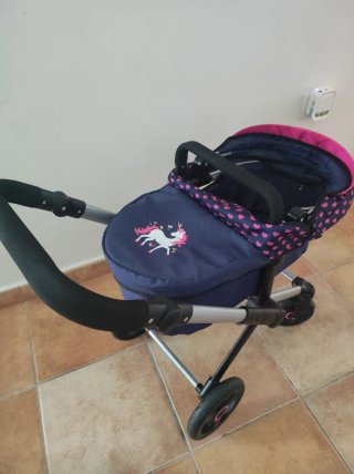 Carrito de muñecas azul con unicornio