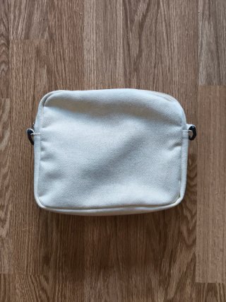 Bolso de tela beige con dibujo