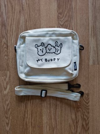 Bolso de tela beige con dibujo