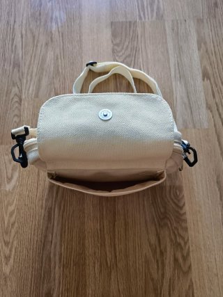 Bolso de tela beige con dibujo