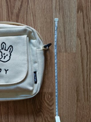 Bolso de tela beige con dibujo