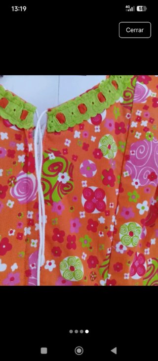 Traje de flamenca naranja y verde