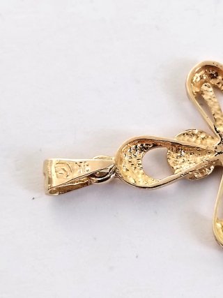 Cruz de oro 18k 1.2gr