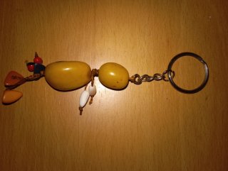 Portachiavi con semi e macramè fatto a mano
