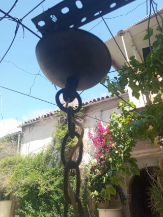 Farol clásico de metal y cristal