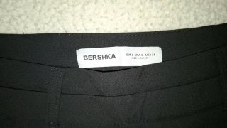 Falda short corta plisada negra