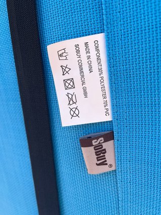 Tumbona plegable azul turquesa con  cojin y asas
