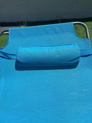 Tumbona plegable azul turquesa con  cojin y asas