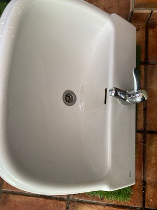 Lavabo de cerámica blanco