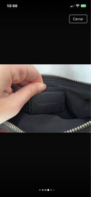 Bolso de rayas negro y rojo