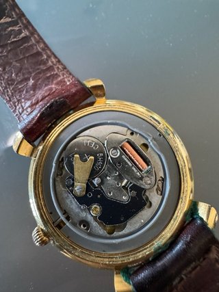 Reloj Nowley Dorado y Marrón