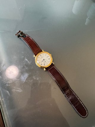 Reloj Nowley Dorado y Marrón