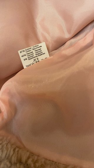 Chaqueta corta pelo sintético rosa