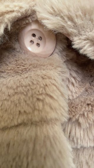 Chaqueta corta pelo sintético rosa