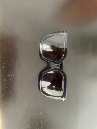 Gafas de sol Christian Dior negras y doradas