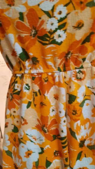 Tutina estiva floreale arancione
