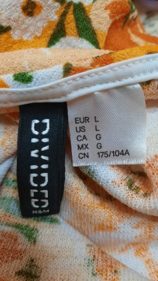 Tutina estiva floreale arancione