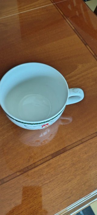 Tazze ceramica con oche natalizie