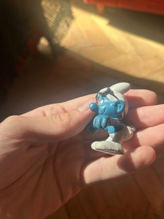 Figuras de Pitufos en Mecedora