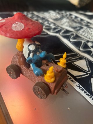 Figuras de Pitufos en Mecedora