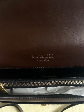 Bolsa Coach castanha com 2 fivelas