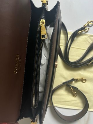 Bolsa Coach castanha com 2 fivelas