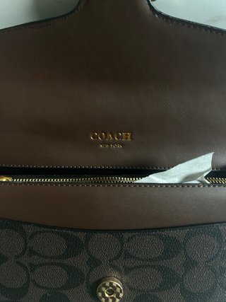 Bolsa Coach castanha com 2 fivelas