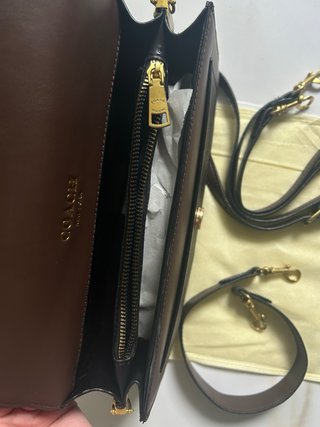Bolsa Coach castanha com 2 fivelas